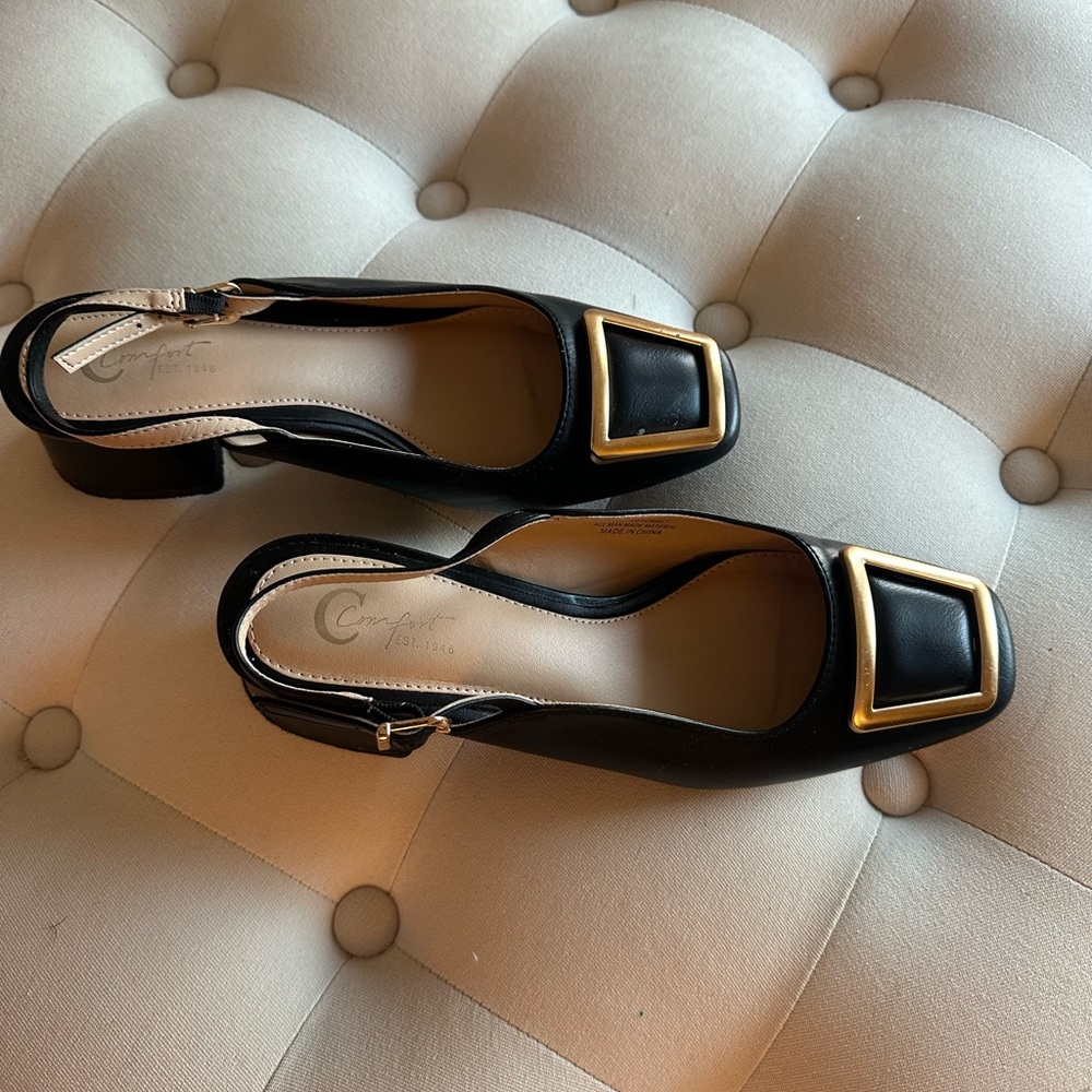 Elegant Black Heels with Gold Accents